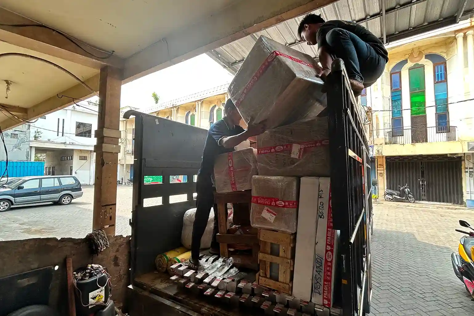 packing cargo ke manado yang aman