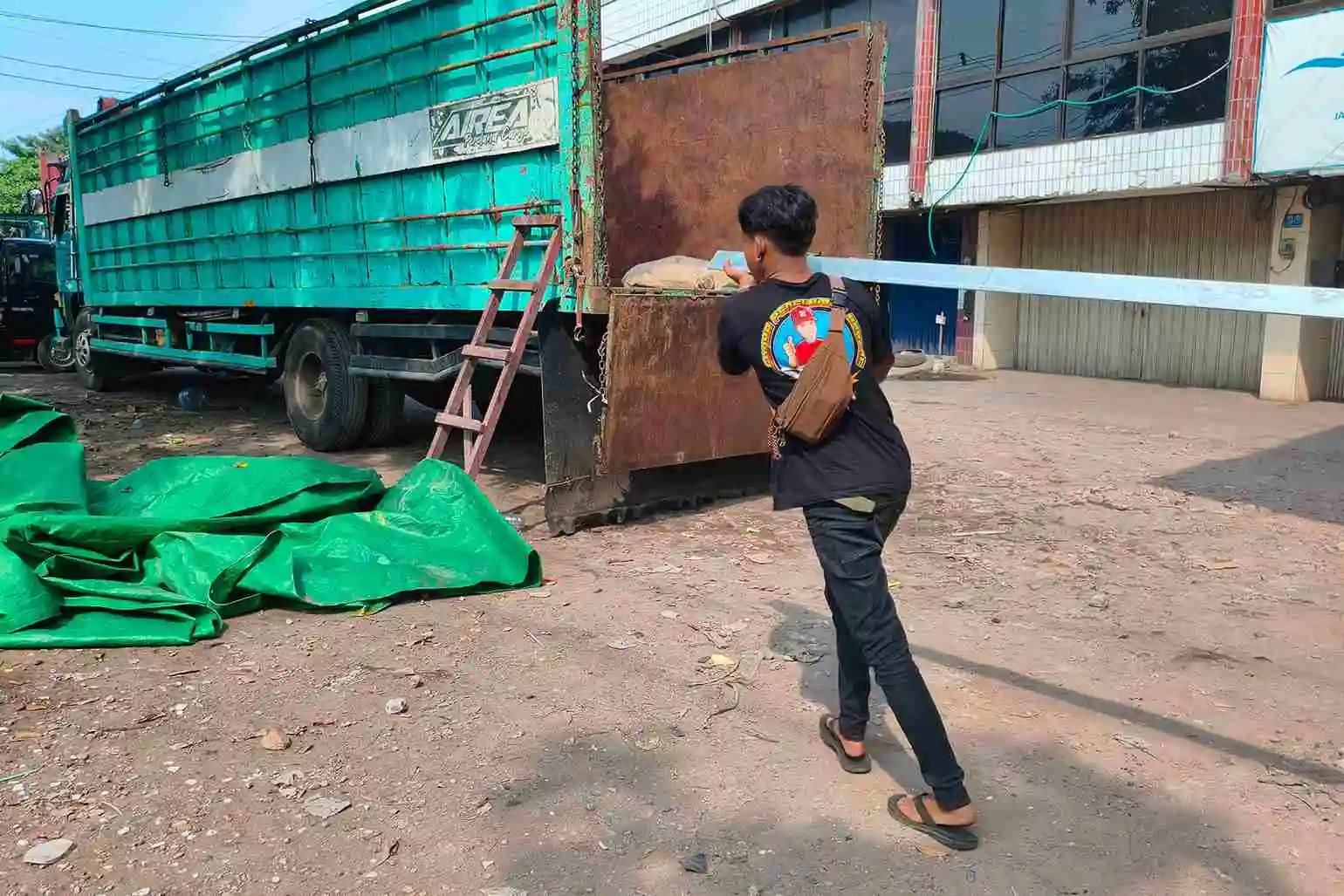sistem operasional cargo container ke Manado